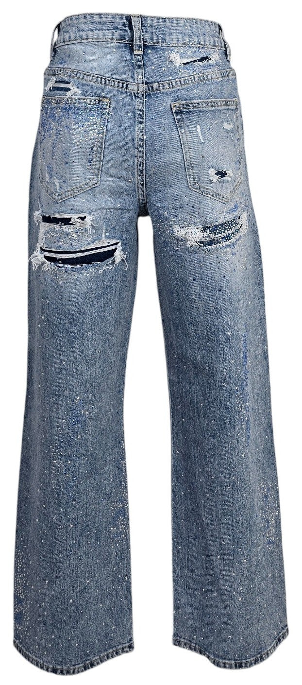 Jeans strappi e strass