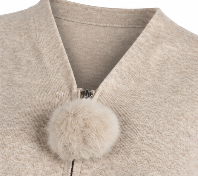 Cardigan con pompon