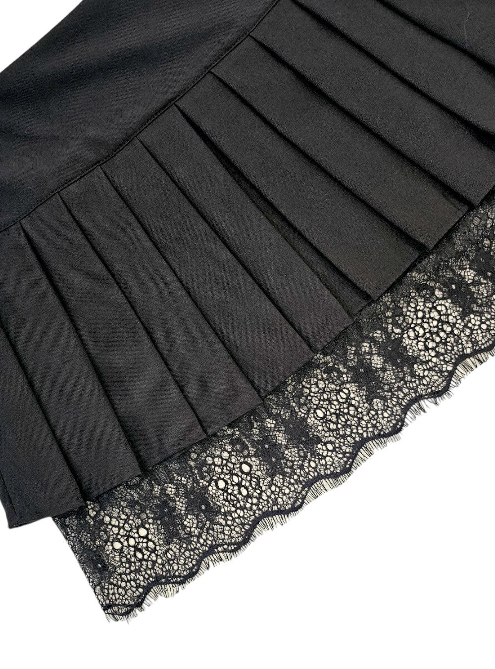 Black pleated miniskirt with lace flounce